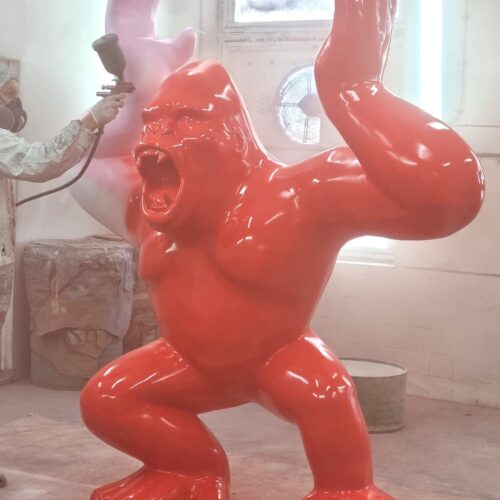 large red fiberglass gorilla statue